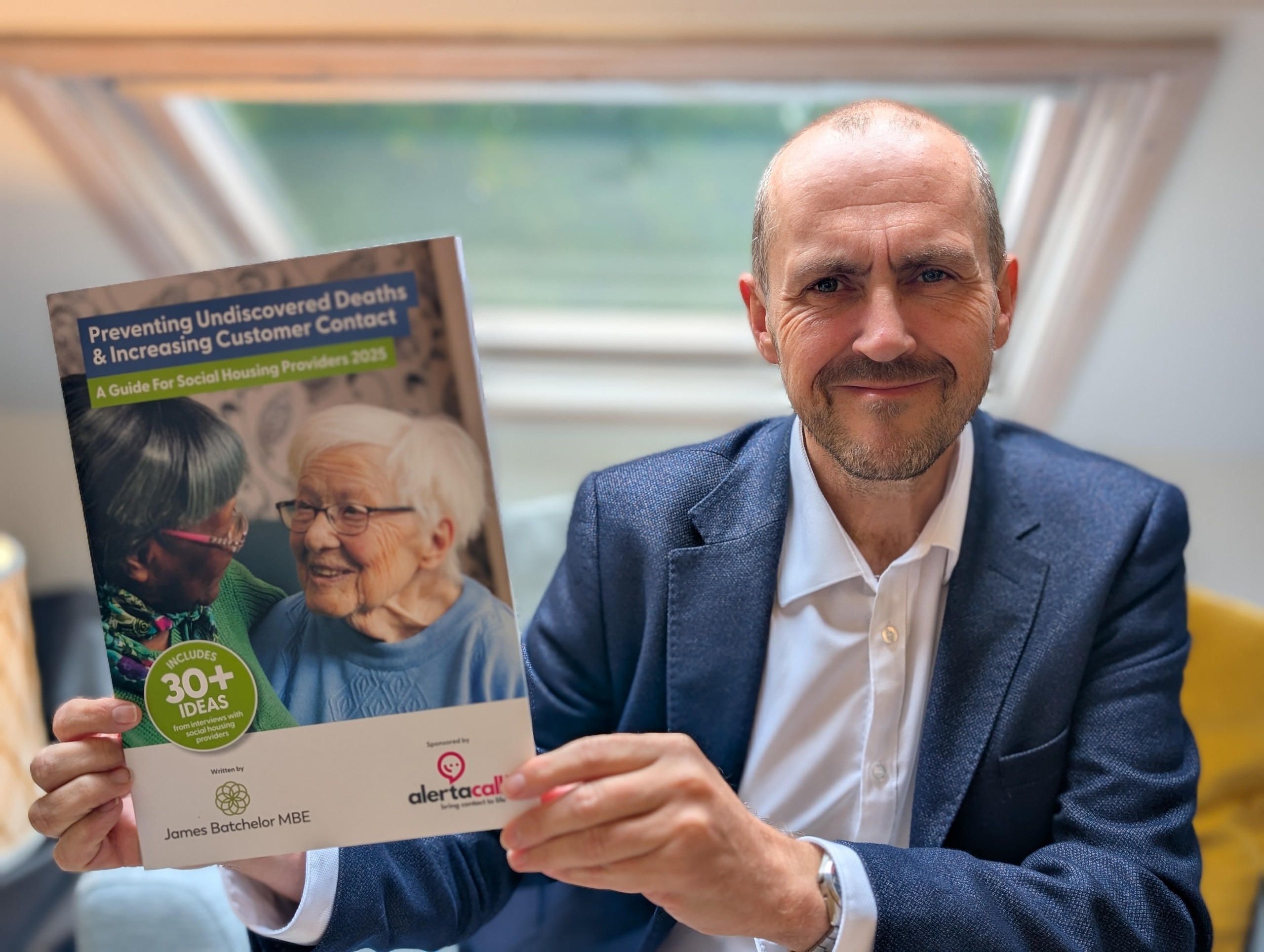 Photo of James Batchelor MBE holding Preventing Undiscovered Deaths & Increasing Customer Contact Guide Photo of James Batchelor MBE holding Preventing Undiscovered Deaths & Increasing Customer Contact Guide